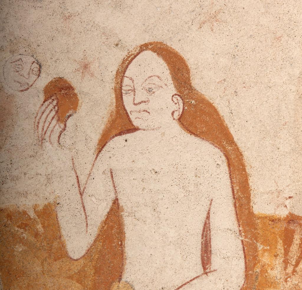 Les visages d'Ève et du serpent, détail de la scène de la Tentation d'Adam et Ève, peinte sur le registre supérieur de la retombée nord de la voûte.