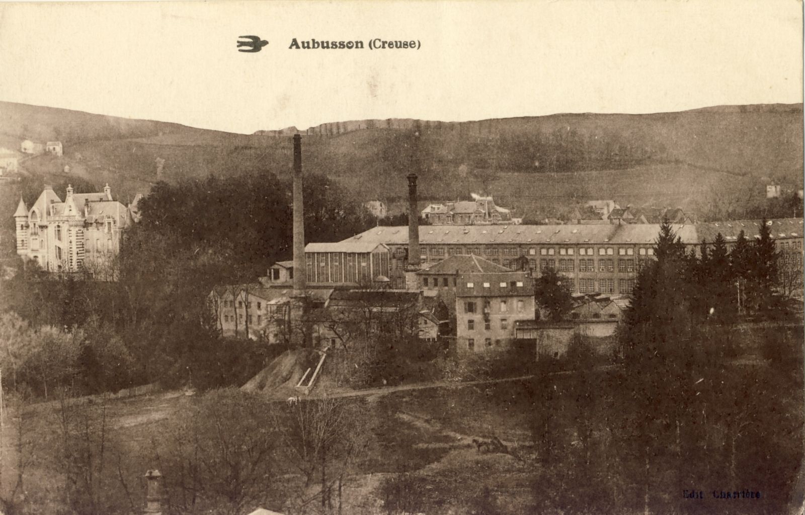 Carte postale des usines Sallandrouze au début du 20e siècle, avec les terrains vagues qui l'entouraient jusqu'à la Creuse et, à gauche, le château Saint-Jean (collection particulière)