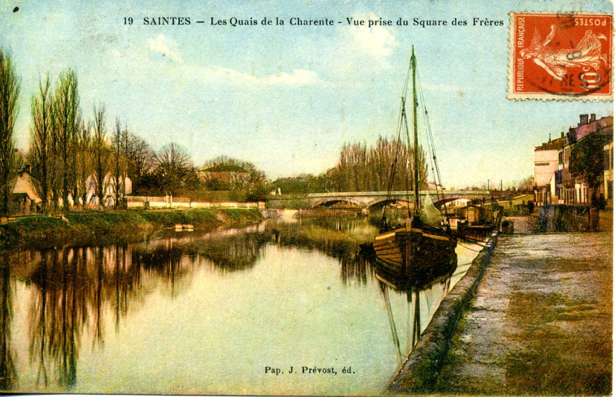 Carte colorisée montrant le quai avec une gabare accostée et le pont Palissy.