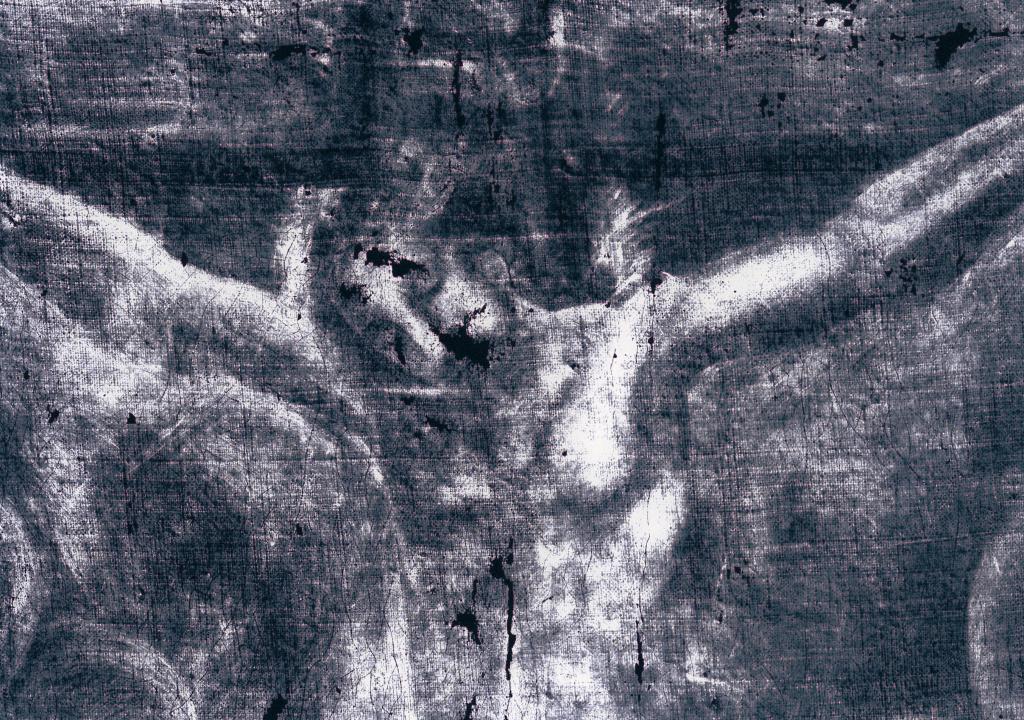 Détail de la tête du Christ, aux rayons X. Elle est orientée à gauche, contrairement au tableau actuel.