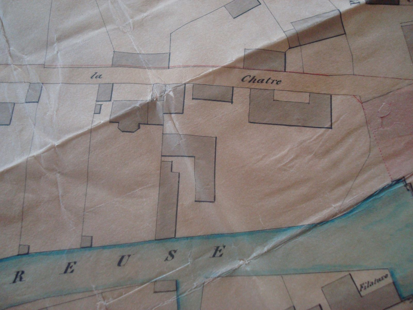 Extrait du plan de la ville d'Aubusson et de ses faubourgs dans la seconde moitié du 19e siècle, avec les bâtiments de la manufacture de tapis Sallandrouze de Lamornaix (Archives Nationales)