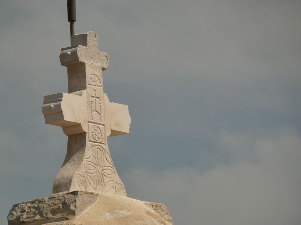 La croix du mur clocher.